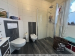 Walmdachbungalow mit Einliegerwohnung in Esterwegen! - Badezimmer im Erdgeschoss Bild II