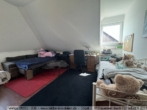 Walmdachbungalow mit Einliegerwohnung in Esterwegen! - Schlafzimmer im Dachgeschoss